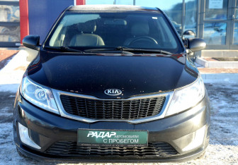 Подержанный автомобиль Kia Rio Sedan 2014 года (2 фото)