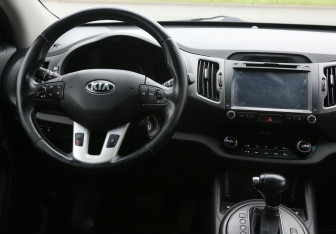 Подержанный автомобиль Kia Sportage 2013 года (14 фото)