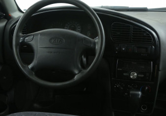 Подержанный автомобиль Kia Spectra Sedan 2006 года (14 фото)