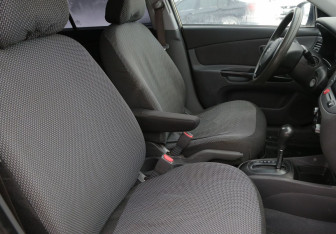 Подержанный автомобиль Kia Rio Sedan 2010 года (10 фото)