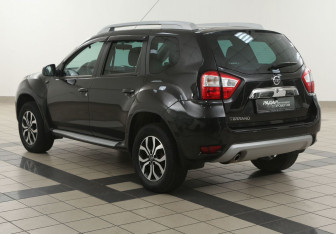 Подержанный автомобиль Nissan Terrano 2014 года (2 фото)