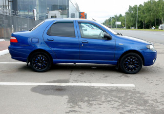 Подержанный автомобиль Fiat Albea 2011 года (7 фото)
