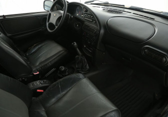 Подержанный автомобиль Chevrolet Niva 2008 года (9 фото)