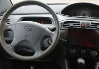 Подержанный автомобиль Hyundai Matrix 2004 года (14 фото)