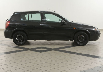 Подержанный автомобиль Nissan Almera Hatchback 2005 года (5 фото)