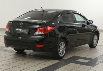 Подержанный автомобиль Hyundai Solaris Sedan 2013 года (4 фото)