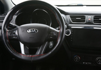 Подержанный автомобиль Kia Rio Sedan 2013 года (14 фото)