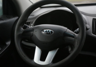 Подержанный автомобиль Kia Sportage 2012 года (16 фото)