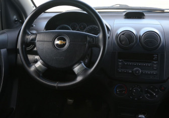Подержанный автомобиль Chevrolet Aveo Hatchback 2010 года (14 фото)