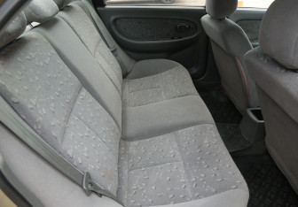 Подержанный автомобиль Kia Spectra Sedan 2009 года (11 фото)