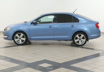 Подержанный автомобиль Skoda Rapid Liftback 2014 года (7 фото)