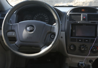 Подержанный автомобиль Kia Cerato Sedan 2006 года (14 фото)