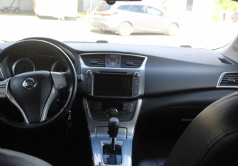 Подержанный автомобиль Nissan Tiida Hatchback 2015 года (13 фото)