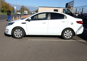 Подержанный автомобиль Kia Rio Sedan 2013 года (8 фото)