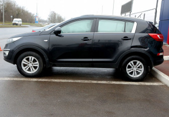 Подержанный автомобиль Kia Sportage 2012 года (8 фото)