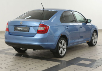 Подержанный автомобиль Skoda Rapid Liftback 2014 года (4 фото)