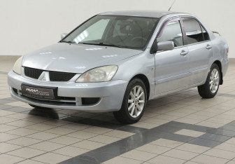 Подержанный автомобиль Mitsubishi Lancer Sedan 2006 года (8 фото)