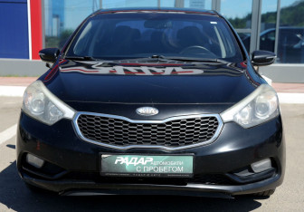 Подержанный автомобиль Kia Cerato Sedan 2013 года (2 фото)