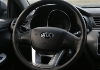 Подержанный автомобиль Kia Rio Hatchback 2014 года (16 фото)