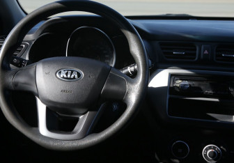 Подержанный автомобиль Kia Rio Sedan 2014 года (14 фото)