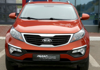 Подержанный автомобиль Kia Sportage 2013 года (2 фото)