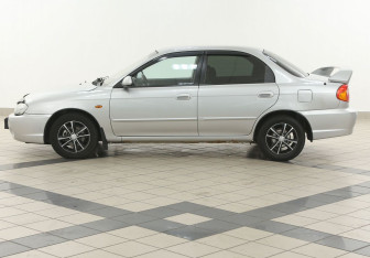 Подержанный автомобиль Kia Spectra Sedan 2008 года (7 фото)