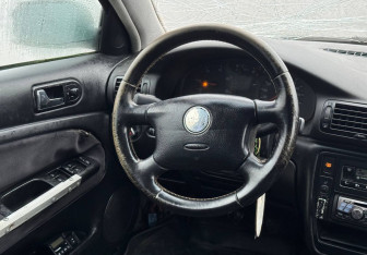 Подержанный автомобиль Volkswagen Passat Wagon 1999 года (12 фото)