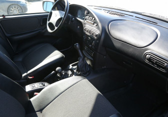 Подержанный автомобиль Chevrolet Niva 2009 года (9 фото)