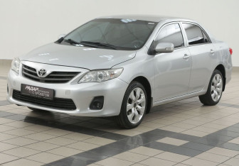 Подержанный автомобиль Toyota Corolla Sedan 2011 года (8 фото)