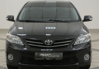 Подержанный автомобиль Toyota Corolla Sedan 2012 года (6 фото)