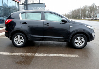 Подержанный автомобиль Kia Sportage 2012 года (7 фото)