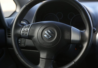 Подержанный автомобиль Suzuki SX4 Hatchback 2011 года (16 фото)