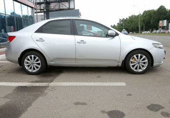 Подержанный автомобиль Kia Cerato Sedan 2011 года (7 фото)