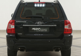 Подержанный автомобиль Kia Sportage 2010 года (3 фото)