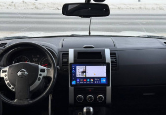 Подержанный автомобиль Nissan X-Trail 2011 года (12 фото)