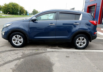 Подержанный автомобиль Kia Sportage 2013 года (8 фото)