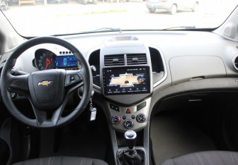 Подержанный автомобиль Chevrolet Aveo Sedan 2013 года (13 фото)