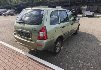 Подержанный автомобиль LADA (ВАЗ) Kalina Wagon 2011 года (7 фото)