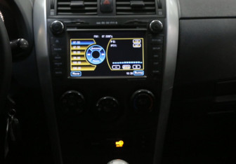 Подержанный автомобиль Toyota Corolla Sedan 2011 года (9 фото)