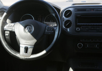 Подержанный автомобиль Volkswagen Tiguan 2014 года (14 фото)