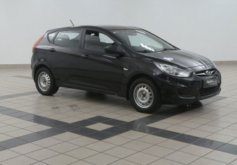 Подержанный автомобиль Hyundai Solaris Hatchback 2011 года (4 фото)
