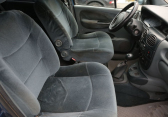 Подержанный автомобиль Renault Scenic 1999 года (10 фото)