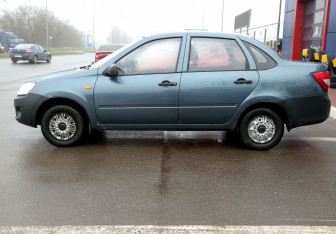 Подержанный автомобиль LADA (ВАЗ) Granta Sedan 2013 года (8 фото)