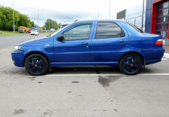 Подержанный автомобиль Fiat Albea 2011 года (8 фото)