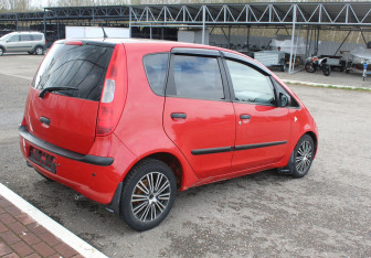 Подержанный автомобиль Mitsubishi Colt Hatchback 2008 года (7 фото)