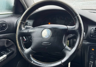 Подержанный автомобиль Volkswagen Passat Wagon 1999 года (13 фото)