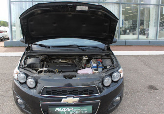 Подержанный автомобиль Chevrolet Aveo Sedan 2013 года (15 фото)