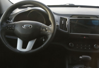 Подержанный автомобиль Kia Sportage 2013 года (14 фото)
