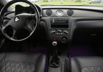 Подержанный автомобиль Mitsubishi Outlander 2006 года (12 фото)