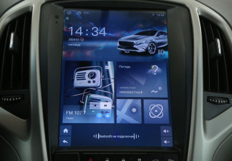 Подержанный автомобиль Opel Astra Hatchback 2011 года (16 фото)